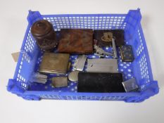 A collection of smoking related items, novelty pistol, cigarette cases,