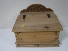 A wooden bread box,