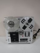 An Akai 1720W Four Track Stereophonic Reel-to-Reel tape recorder.