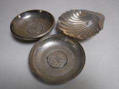A silver butter shell together with two continental silver dishes