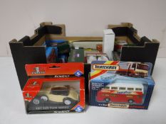 A box containing model cars, Corgi Classics sports cars,