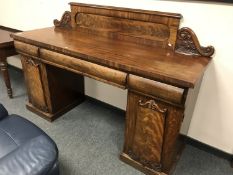 An early Victorian pedestal sideboard