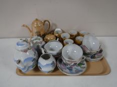 A tray of Japanese egg shell china and decorative coffee ware