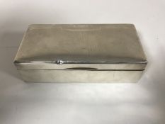 A silver cigarette box