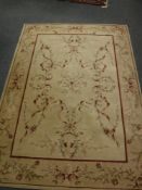 An Indian carpet with floral decoration