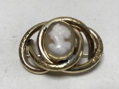 An antique pinchbeck cameo brooch