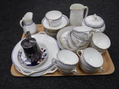 A tray of Victorian gilded tea china, silver plated teapot,