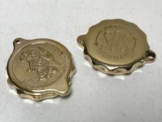 Two SOS talisman pendants