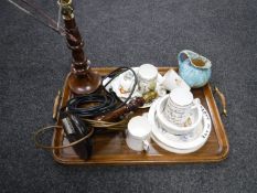 A tray of turned wooden candlestick, antique china plates, antique mug,