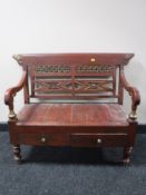 A Chinese style low bench fitted with two drawers