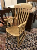 A Victorian beech framed rocking chair