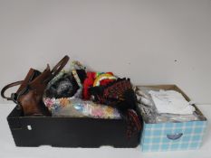 Two boxes containing bags, hats, lacework,