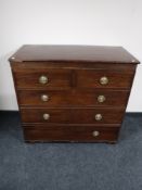 A Victorian mahogany five drawer chest