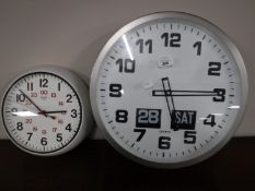 A late 20th century clock and a Student wall clock