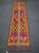 A Suzni Kilim runner,