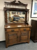 A Victorian walnut mirror backed sideboard