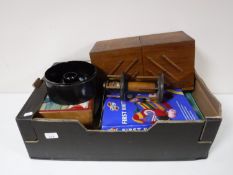 A box containing vintage sewing accessories, concertina sewing box, thread stand, antique tin,