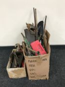 Two boxes containing vintage saws and wood working planes etc