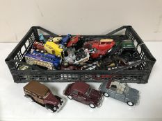 A collection of die cast and other toy cars,