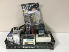 A collection of die cast vehicles, classic motorcycles,