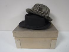 Two hat boxes containing various hats, Dunn & Co.