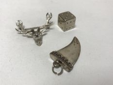 A stag brooch stamped 'Silver',