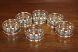 A good matching set of six silver napkin rings, maker H H,