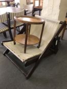 An oak trolley and a large folding deck chair