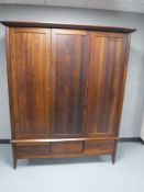 A contemporary triple door wardrobe