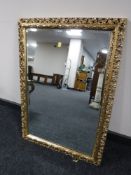 A gilt framed mirror