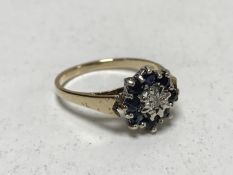 A 9ct gold sapphire and diamond ring