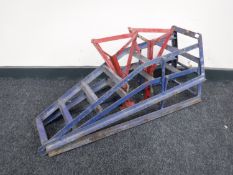 A folding car ramp together with metal car ramp and axle stands