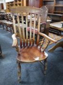 A 19th century elm armchair