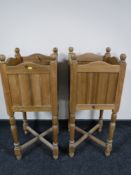 A pair of pine plant stands