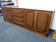 A mahogany low sideboard fitted with drawers