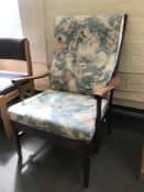 A mid 20th century beech framed armchair