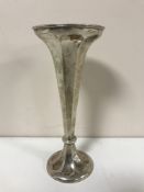 A slender silver vase