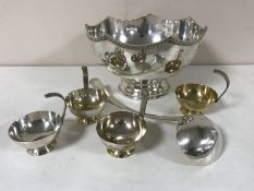 A silver plated punch bowl with ladle and cups CONDITION REPORT: Bowl 31cm in