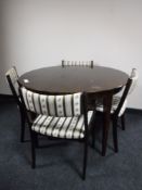 A mahogany extending circular table,