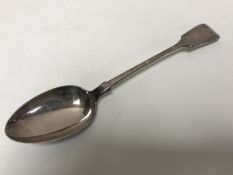 An antique EPNS serving spoon