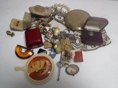 A box of costume jewellery, yellow metal bar brooch, dress ring, evening bag,