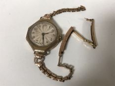 A vintage lady's wristwatch by Rolex, cased numbered 43392 15 Jewels.