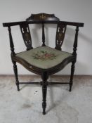 A Victorian inlaid mahogany corner chair