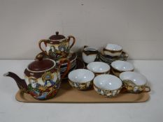 A tray of Japanese egg shell tea china