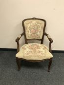 A continental carved mahogany armchair