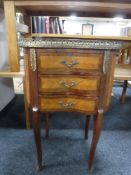 A French inlaid walnut kidney shaped chest