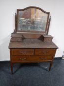 A Victorian inlaid mahogany dressing table