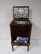 An Edwardian mahogany sewing cabinet with contents