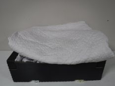 A box of vintage quilts etc