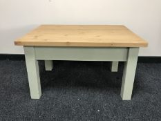 A pine coffee table on painted base